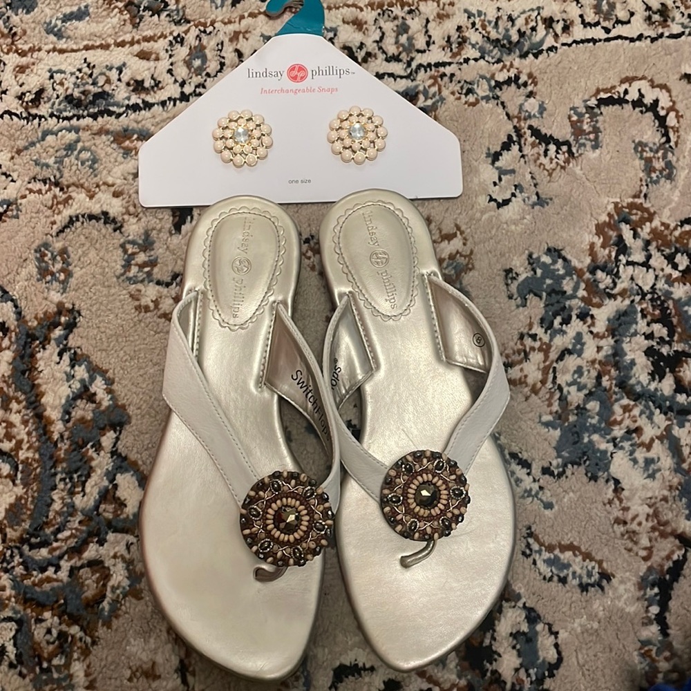 Gold & white Lindsay Phillips Switch flops w/ extra switchable embellishment